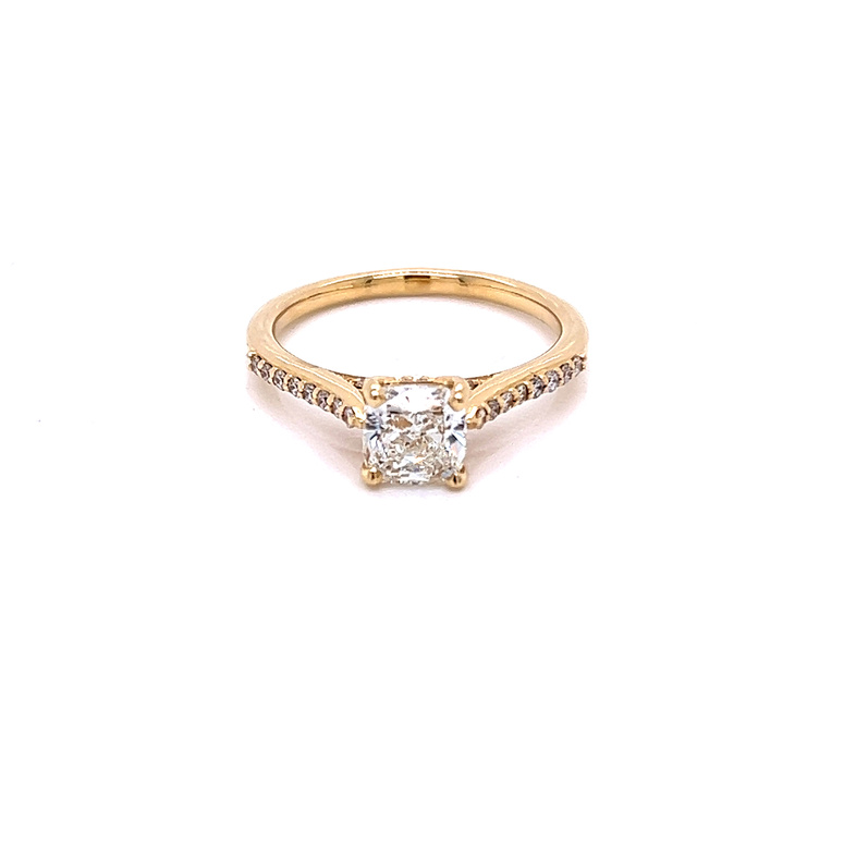 14 Karat yellow gold engagement ring with One 1.00Ct Cushion I VS2 Diamond and 28=0.17Tw Round Brilliant G Vs Diamonds