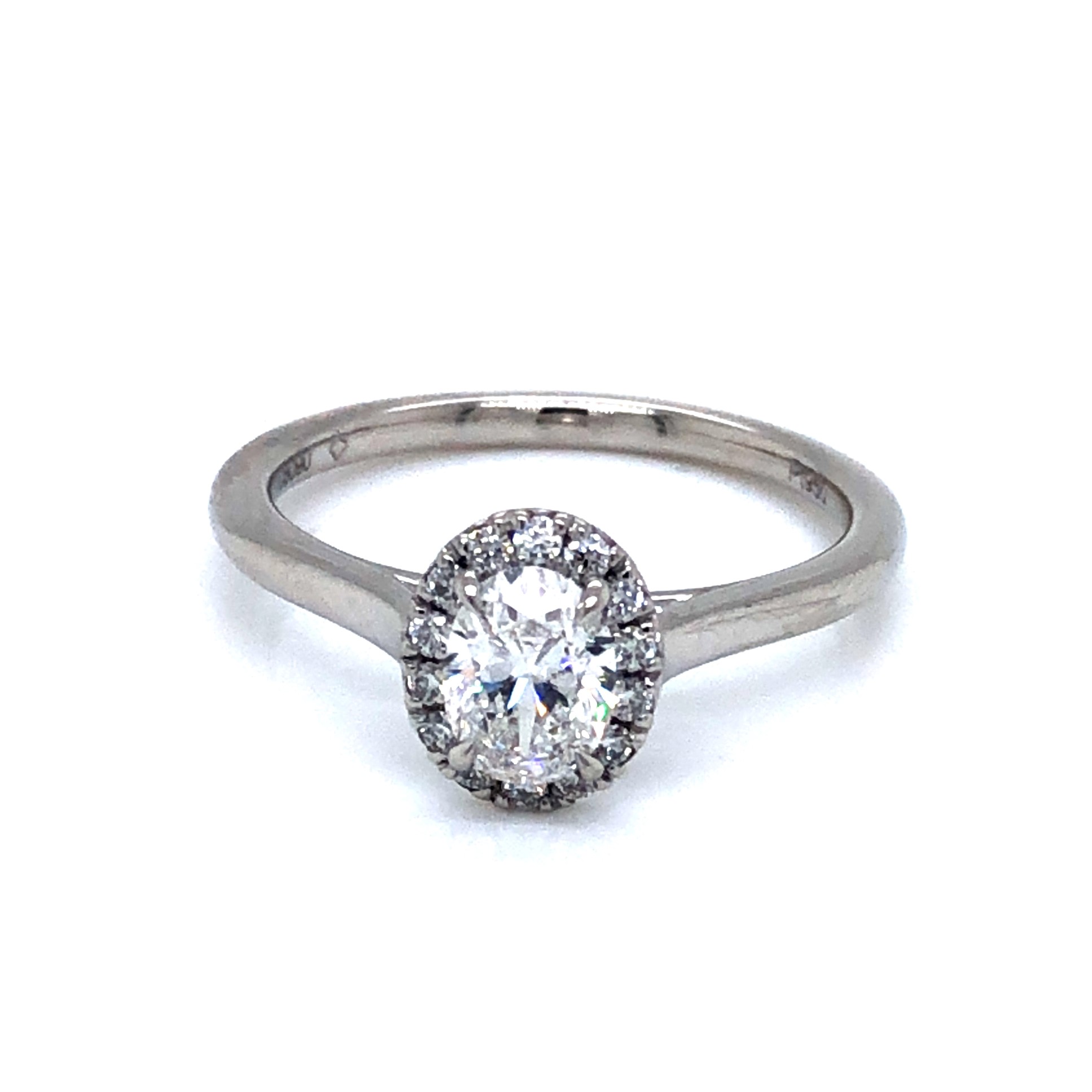 Platinum Engagement Ring With One 0.52Ct Oval F SI2 ForeverMark Diamond And 14=0.15Tw Round Brilliant G VS Diamonds