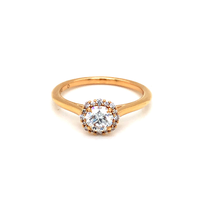 18 Karat Rose Gold Halo Engagement Ring With 16=0.11TW Round Brilliant G SI Diamonds And One 0.50CT Round Brilliant F SI2 Diamond