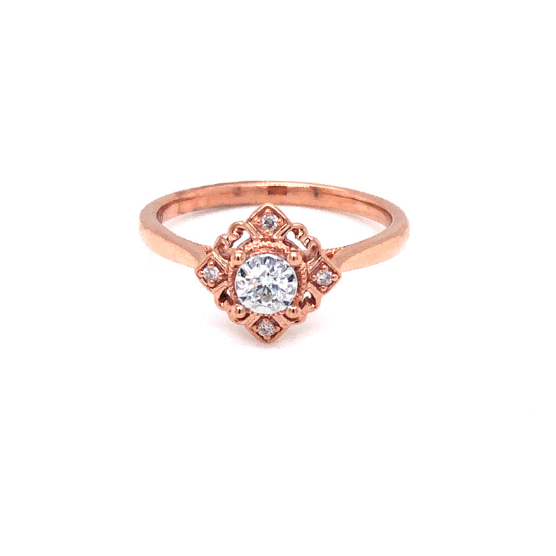 10 Karat Rose Gold Diamond Ring 0.12CTW