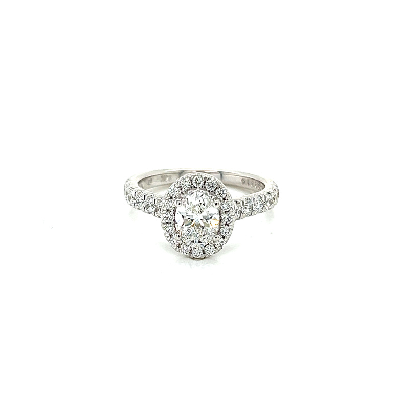 14 Karat white gold engagement ring with One 0.82Ct oval E SI2 Diamond and 38=0.71Tw Round Brilliant E SI Diamonds