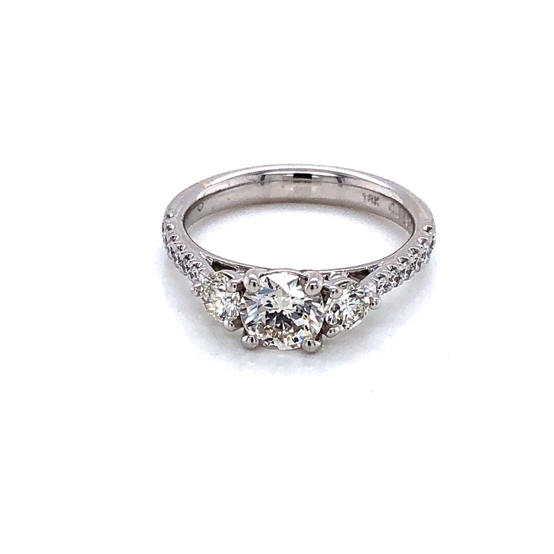 18 Karat white gold engagement ring with One 0.71Ct round brilliant J SI1 Diamond  2=0.38 total weight round brilliant G VS Diamonds and .20 Twt Side Stones  dwt: 2.8
