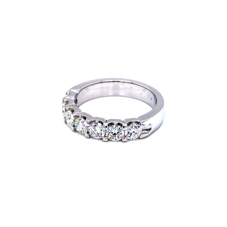 14 karat white gold band with 7=1.27 total weight round brilliant G VS Diamonds. Size 6.5