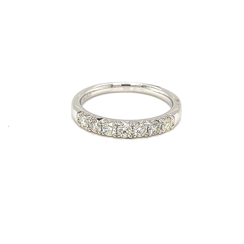 14 Karat white gold wedding band Size 6.5 with 7=0.49 total weight round brilliant G VS Diamonds