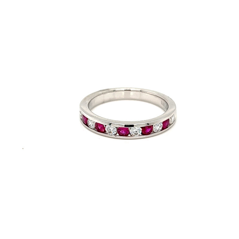 14 Karat white gold channel set wedding band with 6=0.30Tw round brilliant G Fl Diamonds and 5=2.50Mm round Rubies.