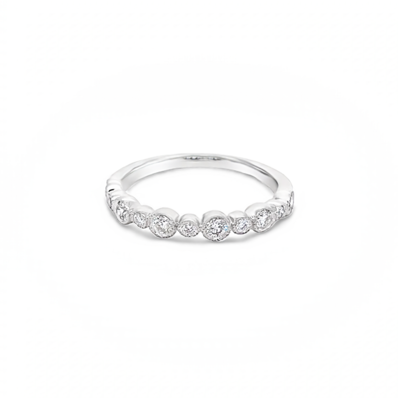 14 Karat white gold bezel/flush wedding band with 11=0.34tw Round Brilliant G VS Diamonds