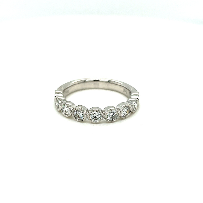 14 Karat white gold bezel set wedding band with milgraining and 9=0.80tw Round Brilliant G VS Diamonds