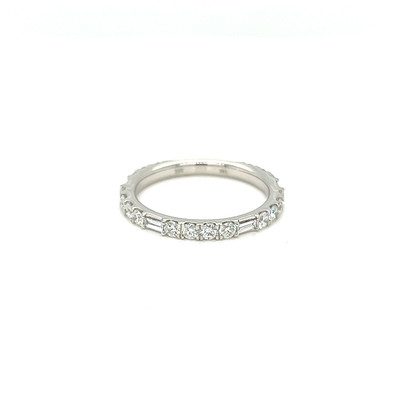 14 Karat white gold wedding band Size 6.5 with18 round brilliant diamonds and 4 baguette dimaonds for a total cart weight ot .80 with G color and  VS clarity