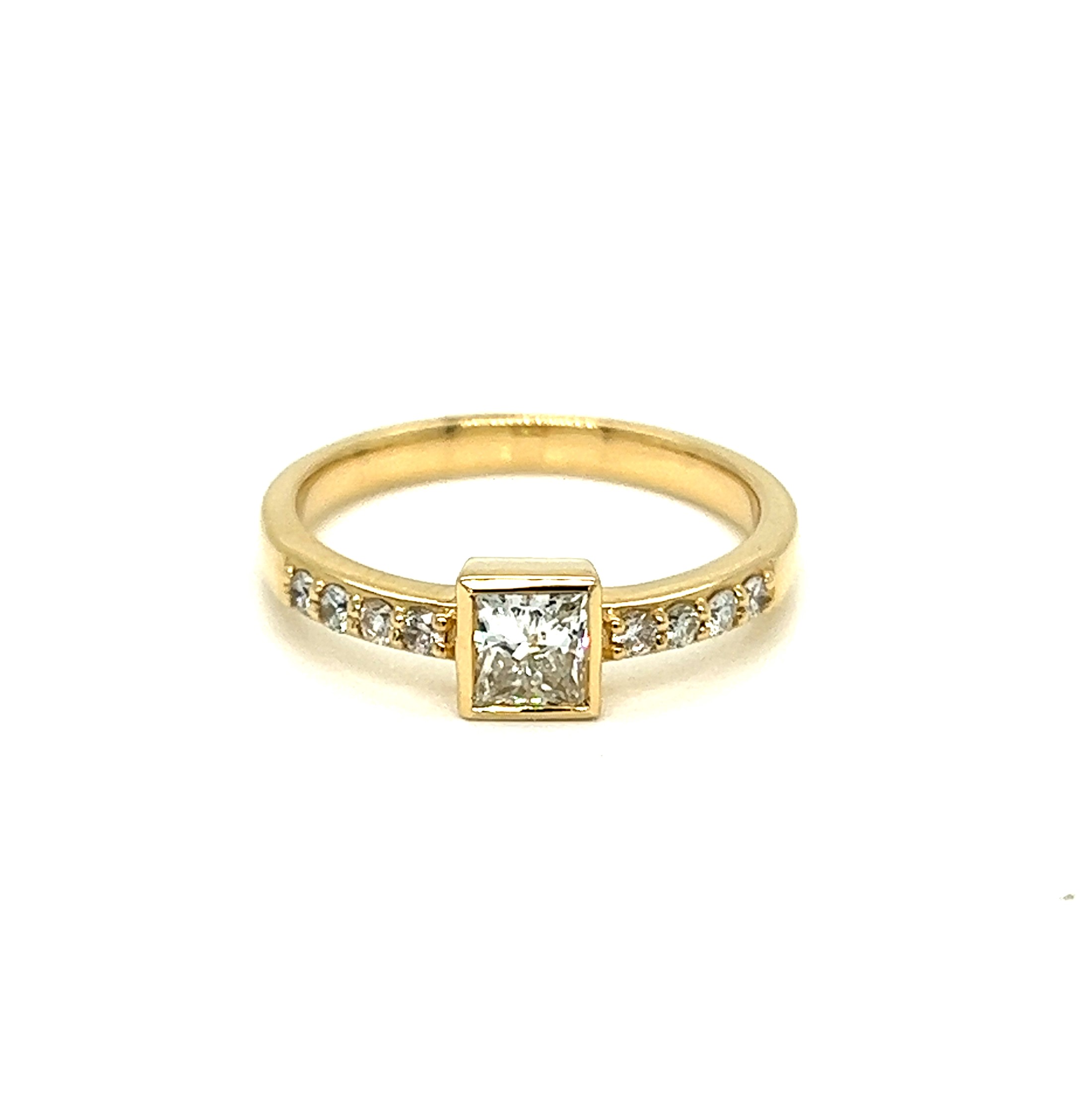 Yellow 14 Karat Contemporary Fashion Ring with one 0.48ct Princess G clarity  I clarity Diamond and   8=0.17tw Round Brilliant G color  I clarity Diamonds