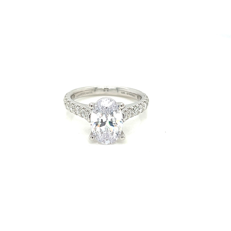14 Karat white gold engagement ring with18=0.60tw round brilliant G VS Diamonds
