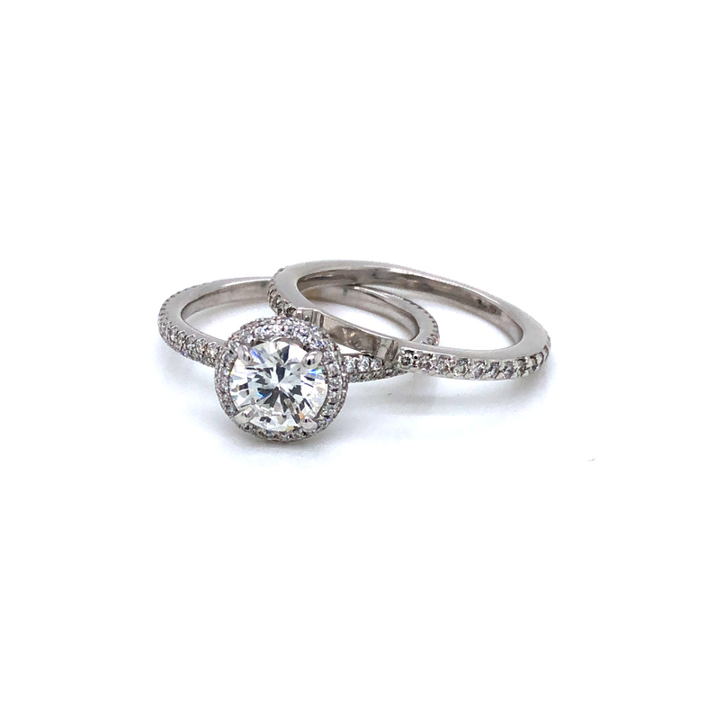14 Karat white gold wedding set with One 0.95Ct Round Brilliant G Si2 Diamond  GIA 2111063635 And 156=0.64Tw Round Brilliant G VS Diamonds