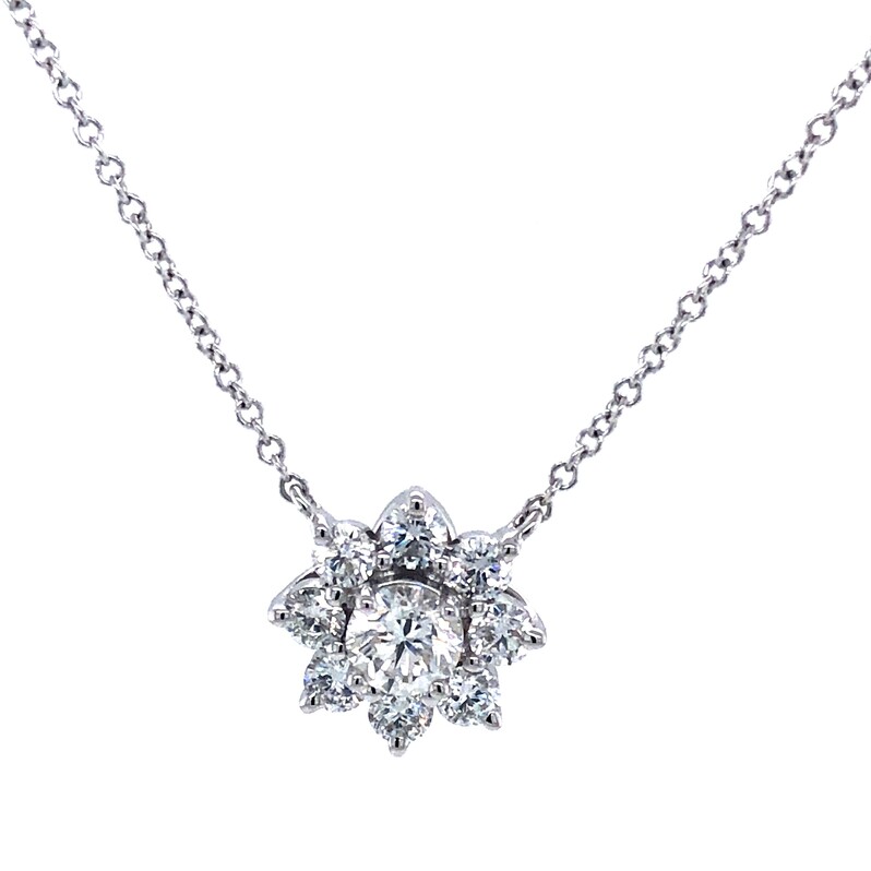 14 karat white gold flower pendant with one 0.47ct round brilliant G VS Diamond and 8=0.68tw round brilliant G VS Diamonds