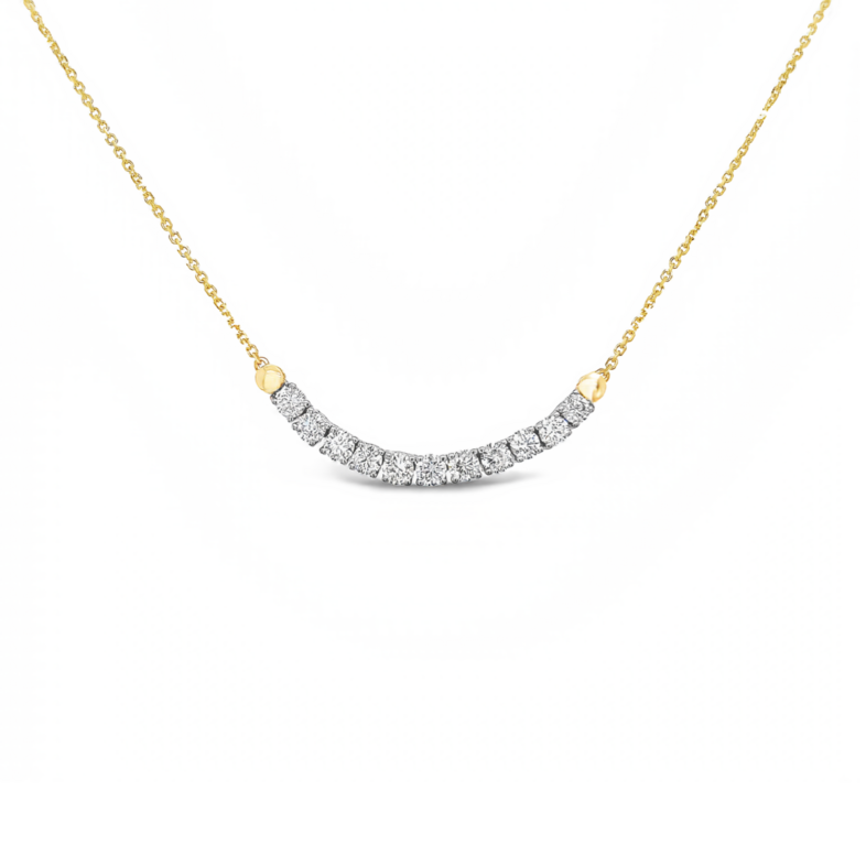 14 Karat yellow gold curved bar necklace with 11=0.97tw Round Brilliant G VS Diamonds