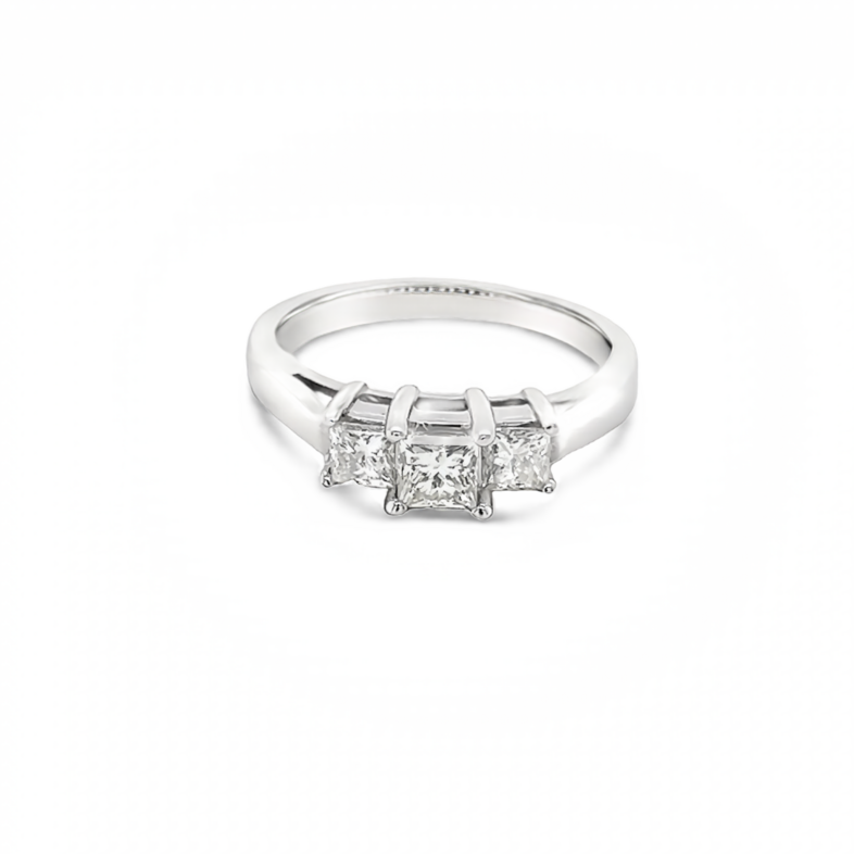 14 Karat white gold three stone engagement ring with 3=0.71tw princess J VS Diamonds
