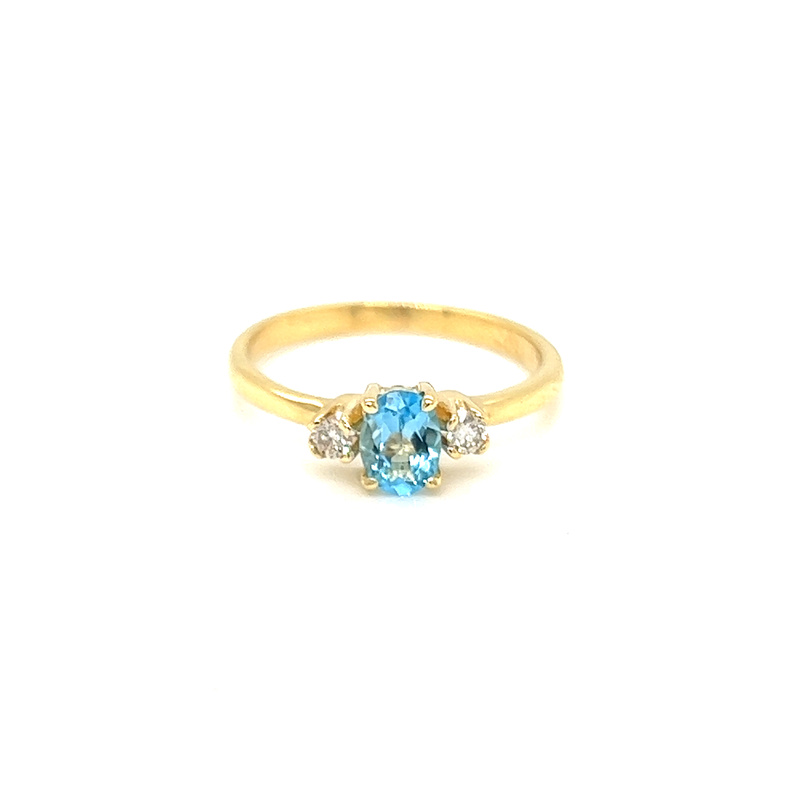 Lady s Yellow 18 Karat Ring With one 6.00x4.00mm Oval Blue Topaz &  2=0.10tw Round Brilliant G SI Diamonds