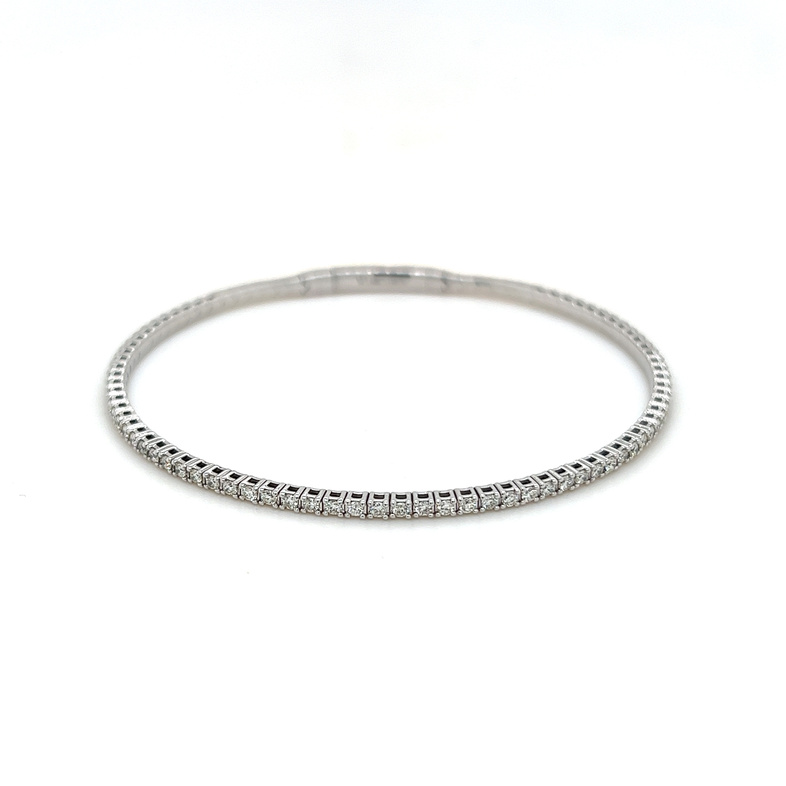 14 Karat white gold flexible bangle with 70=1.00tw Round Brilliant G VS Diamonds