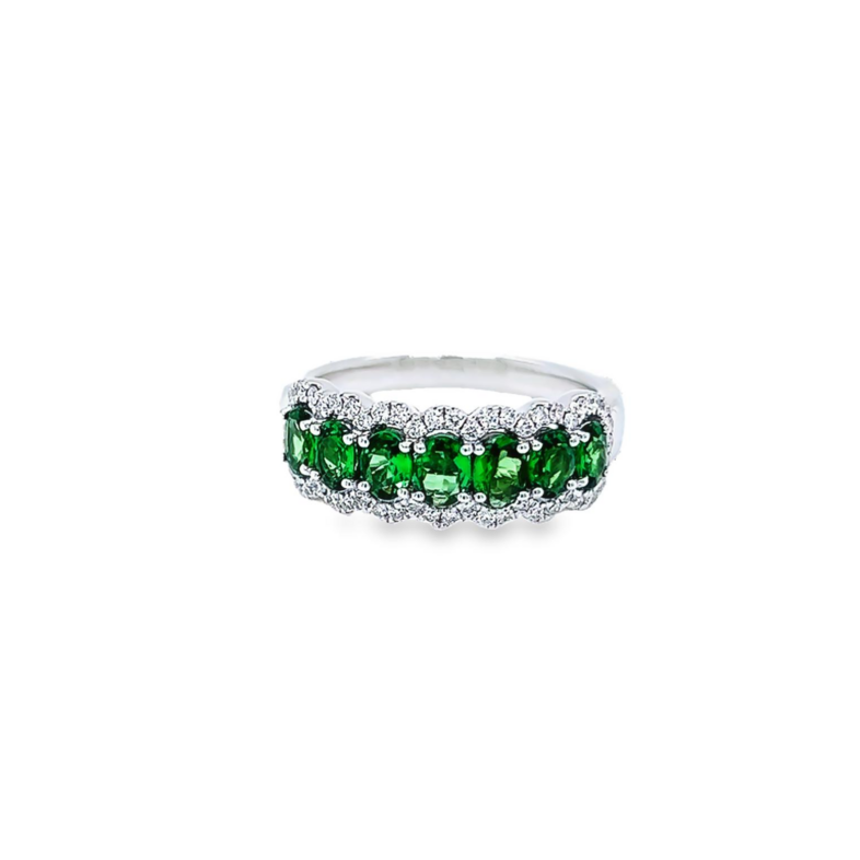 14 Karat white gold ring  size 6.5  with 7=1.25 total weight oval Tsavorite Garnets and 51=0.25 total weight round brilliant G VS Diamonds
