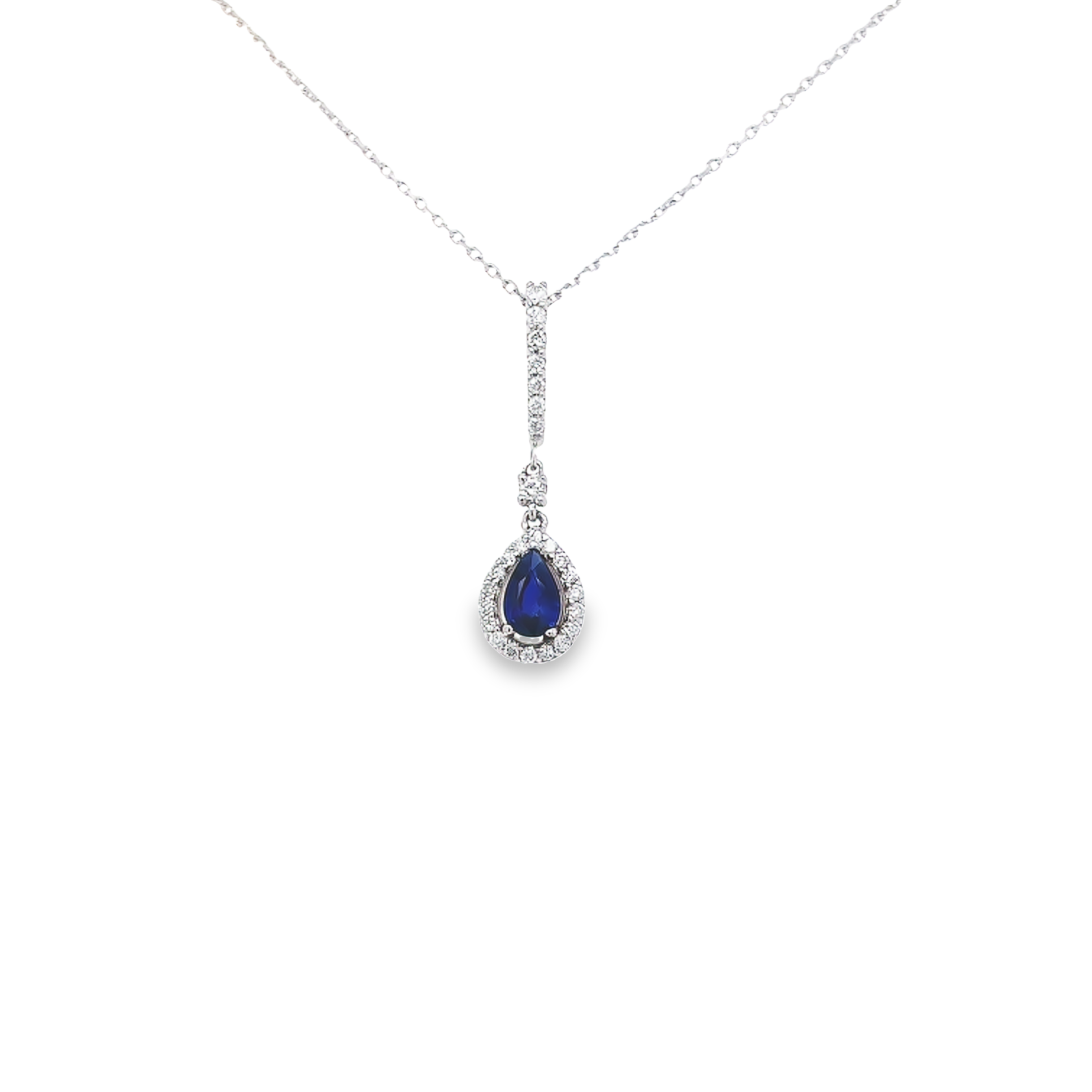 14 Karat white gold pendant with One 0.50Carat pear Sapphire and 26=0.26 total weight round brilliant G SI Diamonds