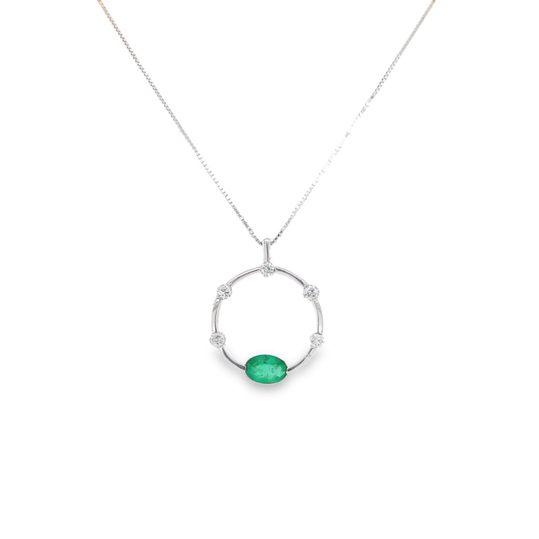 14 Karat white gold circle pendants with One 0.50Ct oval Emerald and 5=0.20 total weight round Brilliant G SI Diamonds