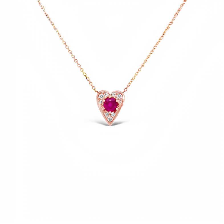 14 karat rose gold heart pendant with One 0.40Ct round Ruby and 9=0.09 total weight round brilliant G VS Diamonds