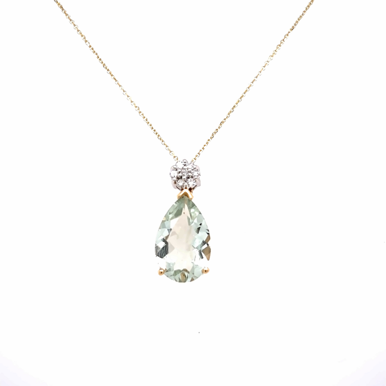 14 Karat yellow gold pendants with 7=0.09 total weight round brilliant G VS Diamonds and One 4.00Carat pear Amethyst