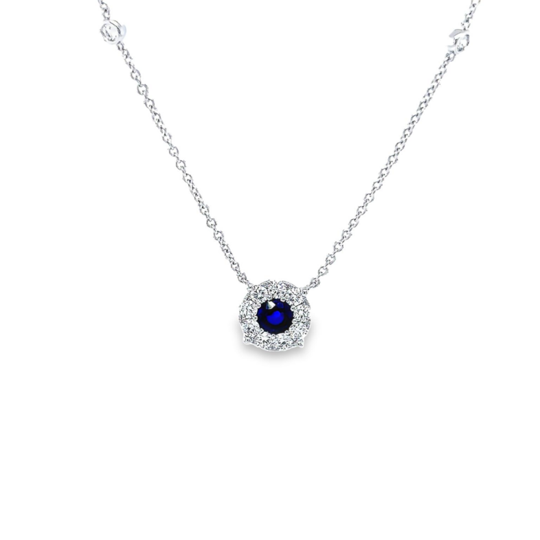 14 Karat white gold halo solitaire necklace with One 0.58Carat round Sapphire and 13=0.44 total weight round brilliant G VS Diamonds