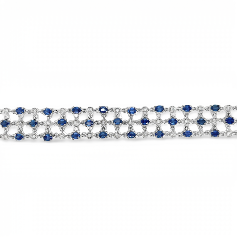 White 14 Karat Statement Bracelet Length 7" With 38=0.97Tw Round Brilliant G VS Diamonds And 40=9.95Tw Round Sapphires