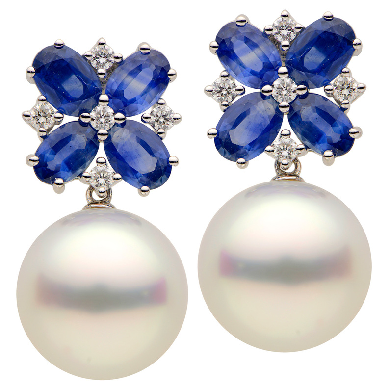 White 18 Karat Dangle Earrings with 2=13.00-14.00mm South Sea Pearls  8=4.60tw Oval Sapphires and   10=0.32tw Round Brilliant G VS Diamonds