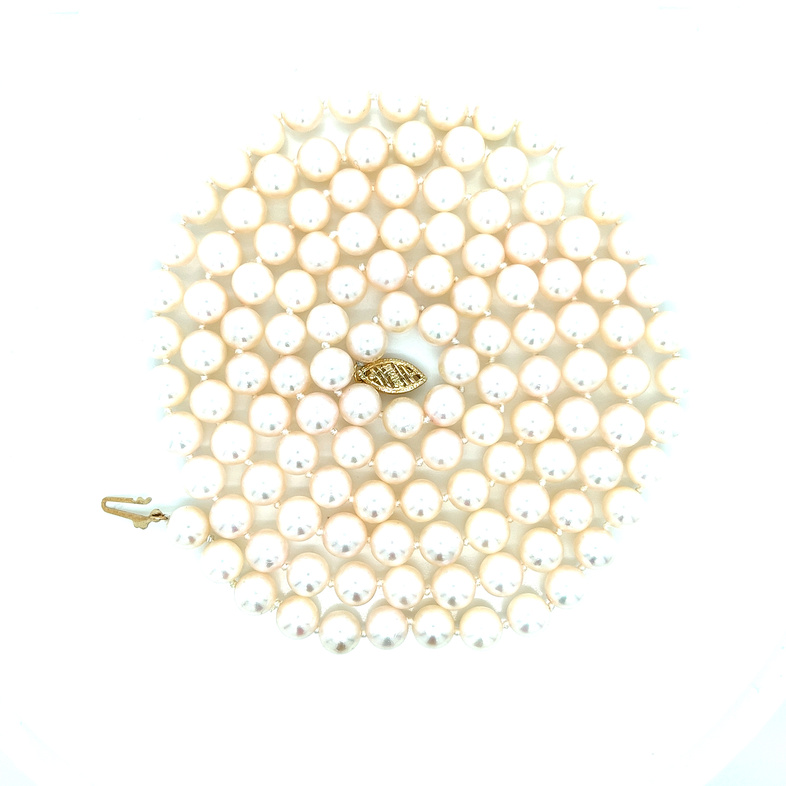 Lady s Yellow 14 Karat Strand Length 36" 124 7.00x6.50mm Cultured Pearls
