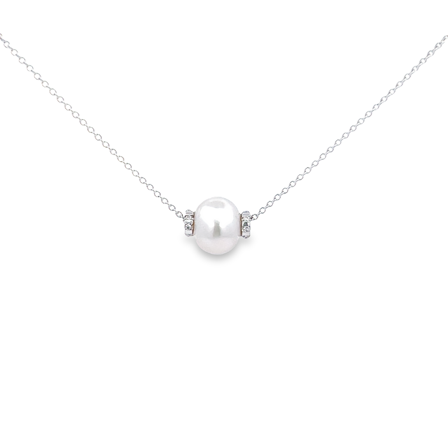 Sterling necklace with One fresh water Pearl and 16=0.06 total weight single cut Diamonds.