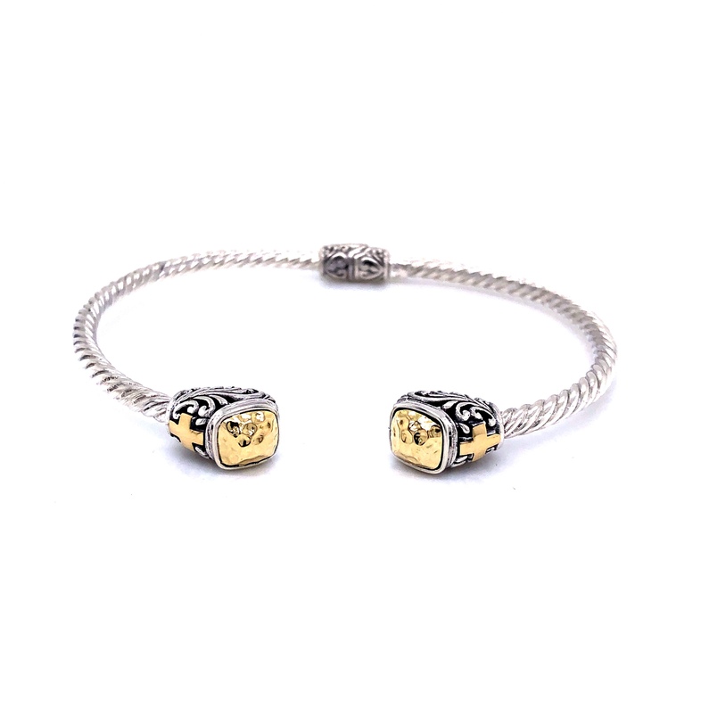 Sterling Silver and 18 karat yellow gold hammered bangle