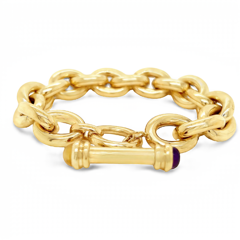 Yellow 14 Karat Large Oval Link Italian Made Bracelet With Toggle Clasp Capped with Gemstones. Length 7  24.15 DWT.