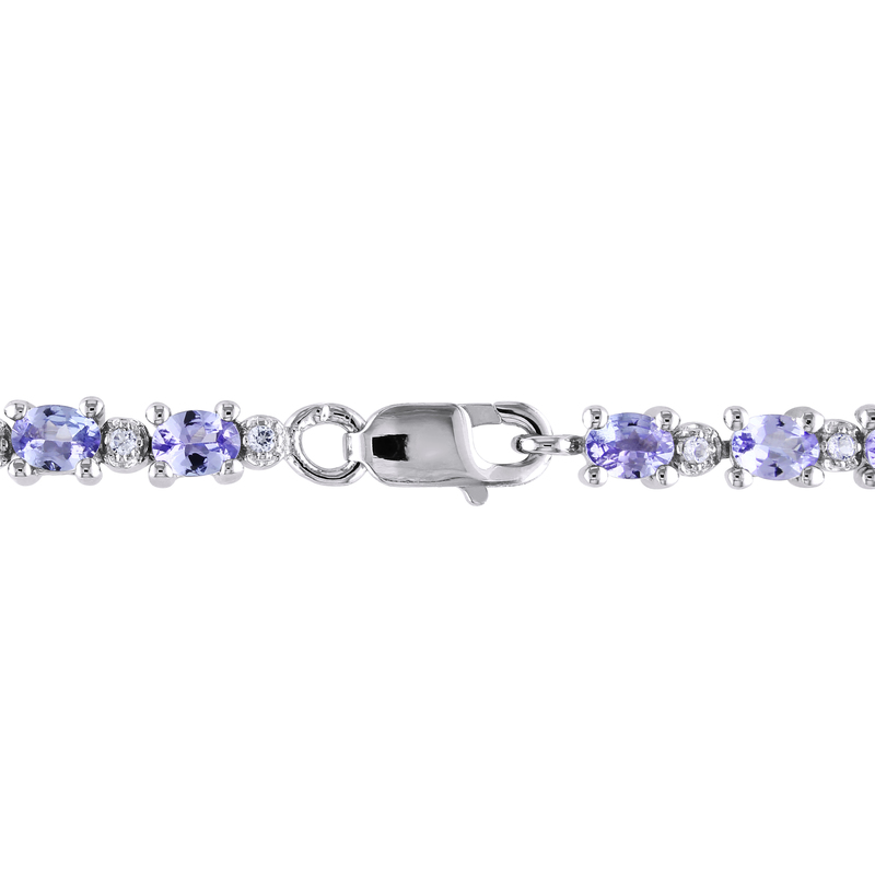 4 2/5 CT TGW Tanzanite and White Topaz Bracelet in Sterling Silver