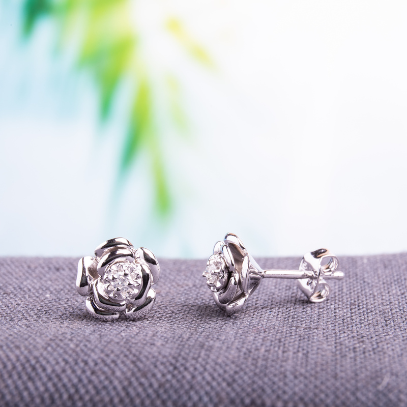 Diamond Accent Floral Stud Earrings in Sterling Silver