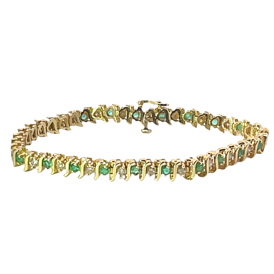 Elegant Diamond And Emerald Bracelet