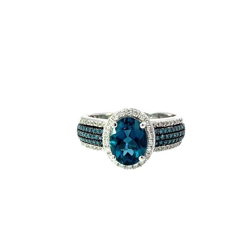 Elegant Blue Topaz And Diamond Ring