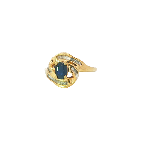 Elegant Yellow Gold Ring With Deep Blue Oval Cabochon Sapphire