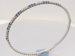 Lady's White 14 Karat Bangle Bracelet With 0.84tw Round Sapphires And 0.42tw Round Diamonds