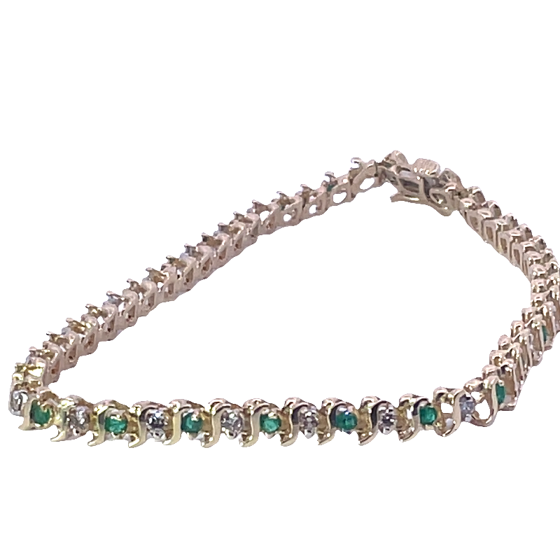 Stunning Diamond And Emerald Tennis Bracelet
