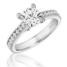 ROUND SOLITAIRE WITH CHANNEL SETTING ENGAGEMENT RING
