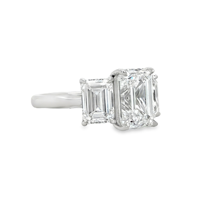 PL Three Stone Lab Grown EM Cut Dia Eng Ring Size 6
C 4.09ct E/VS1   
S 3.06ctw E/VS1-VVS2