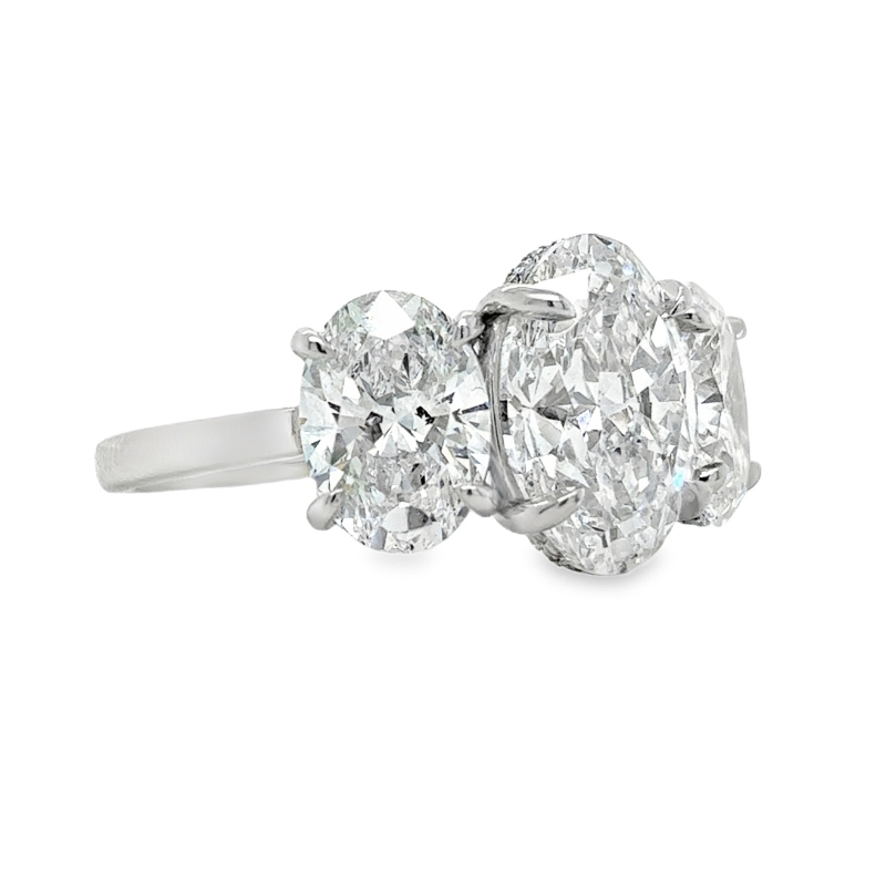 PL Three Stone Lab Grown Oval Dia Eng Ring Size 6.5
C 3.54ctw E VVS2
S 3.03ctw E VVS1-VVS2