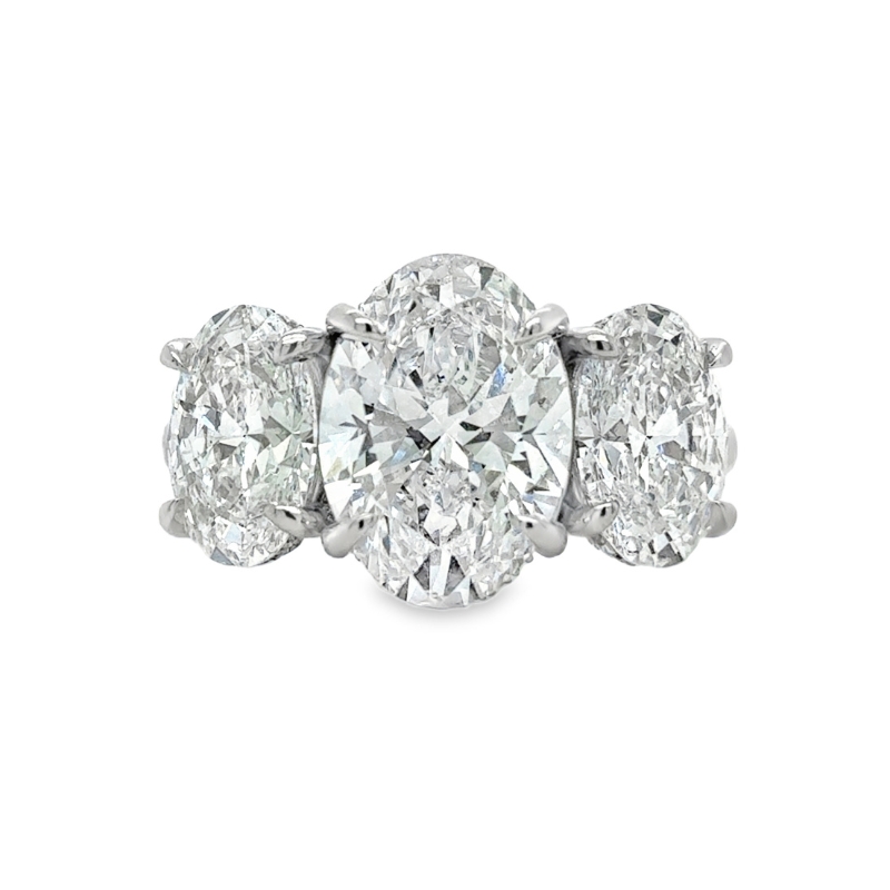 PL Three Stone Lab Grown Oval Dia Eng Ring Size 6.5
C 3.54ctw E VVS2
S 3.03ctw E VVS1-VVS2