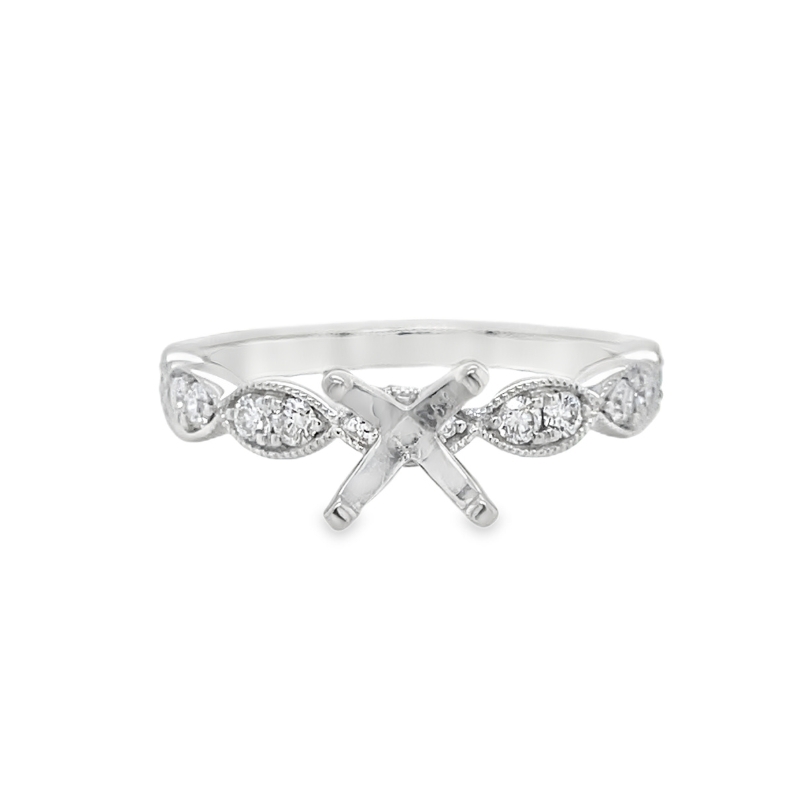 *Setting only, center stone not included*<br>
Timeless 14 karat white gold scalloped engagement ring setting featuring 14 round diamonds totaling 0.32 carat total weight (G color, VS2 clarity). Expertly designed to hold an 6mm round center stone, this se