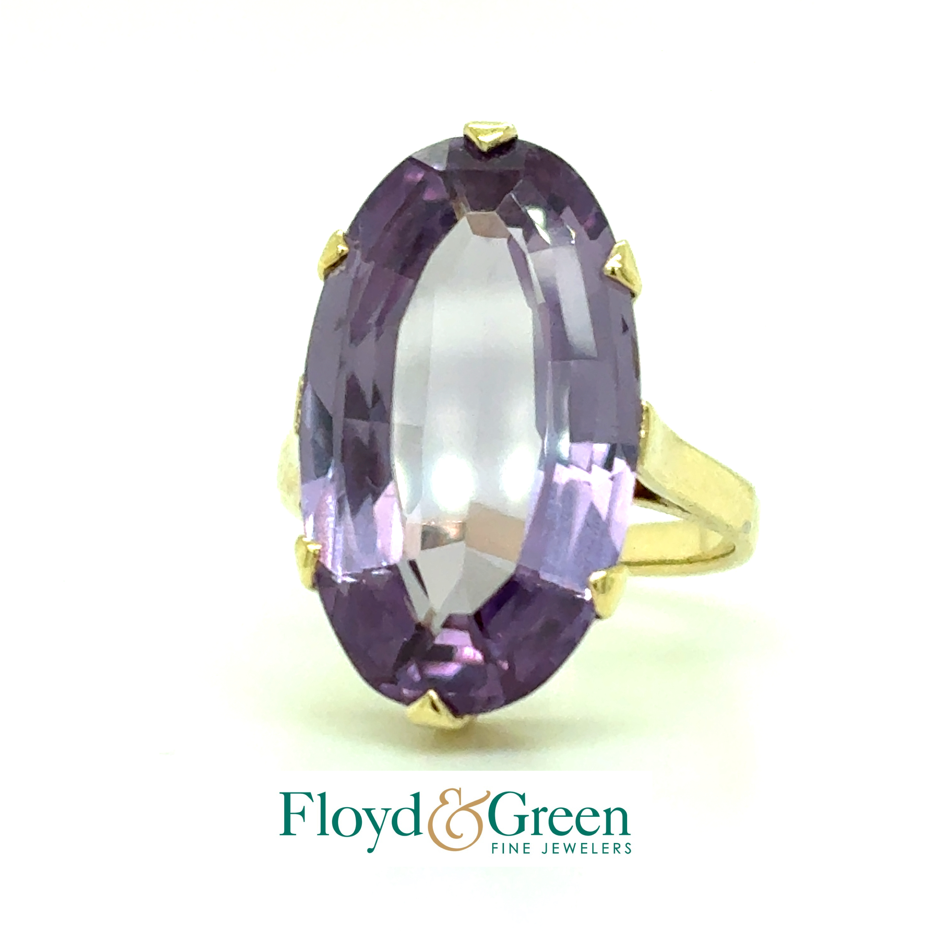 Solitaire 14KY Created Sapphire Oval 13.59ct 
Color: Violetish Blue 
Size: 4.5