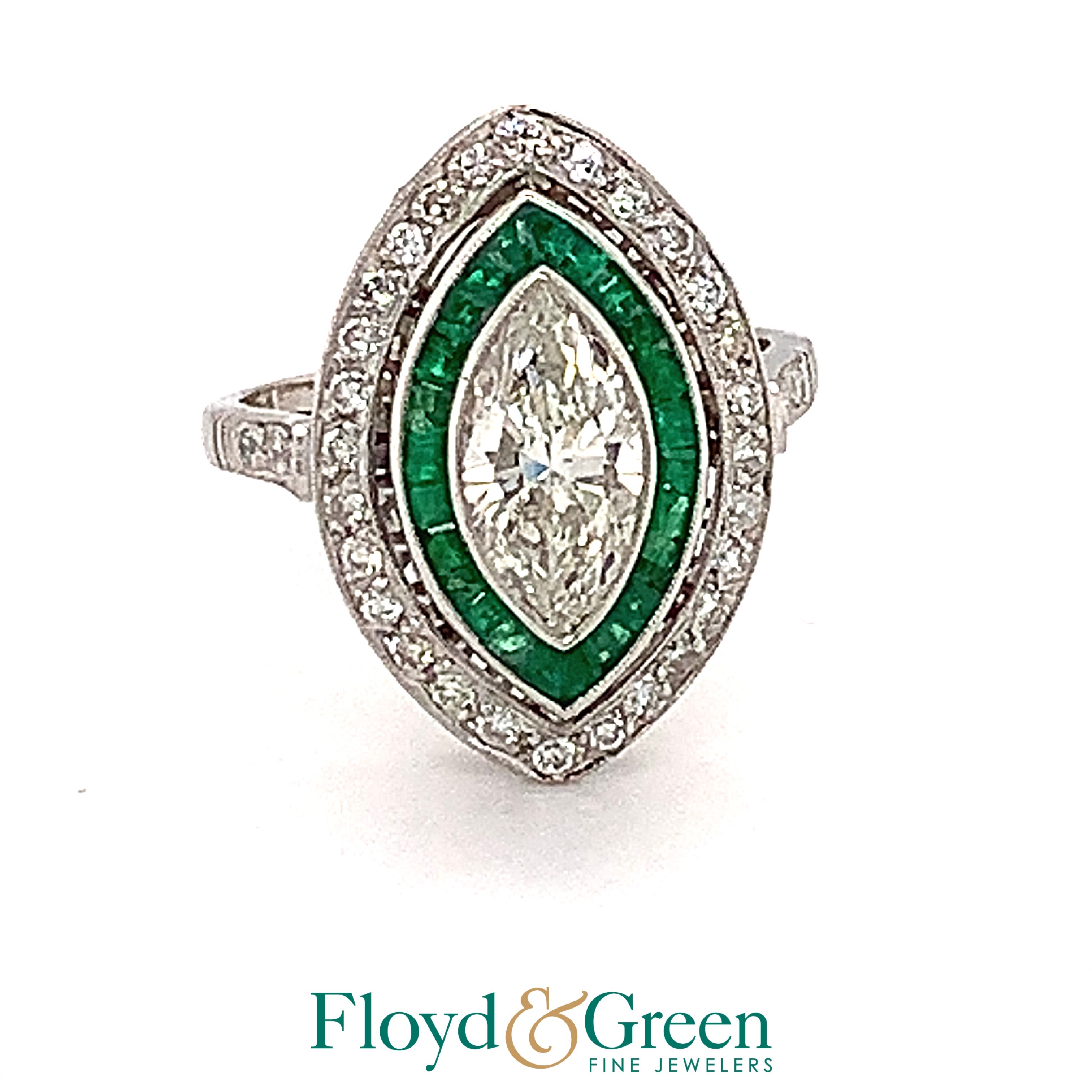Double Halo Platinum White
Diamond Marquise 1.15 ct 
Color: J Clarity: SI2 
* Addtl stones: 24 0.30 ct Very Slightly Bluish Green SI1 
Size: 3.75