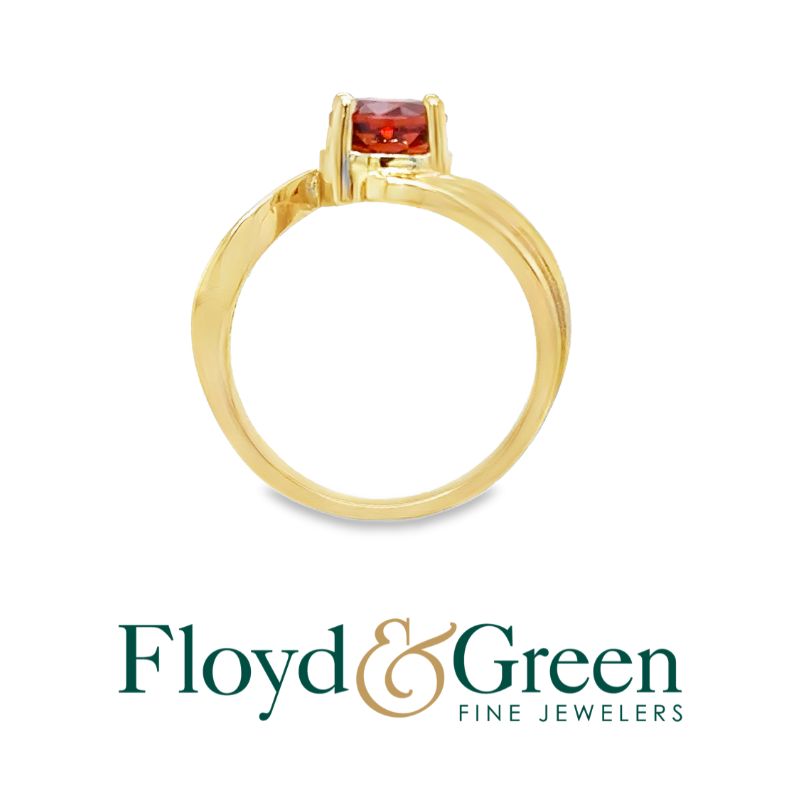 14 Karat Yellow 
Citrine Round 1.10 ct 
Color: Orange Clarity: VS 
 Size: 6.5