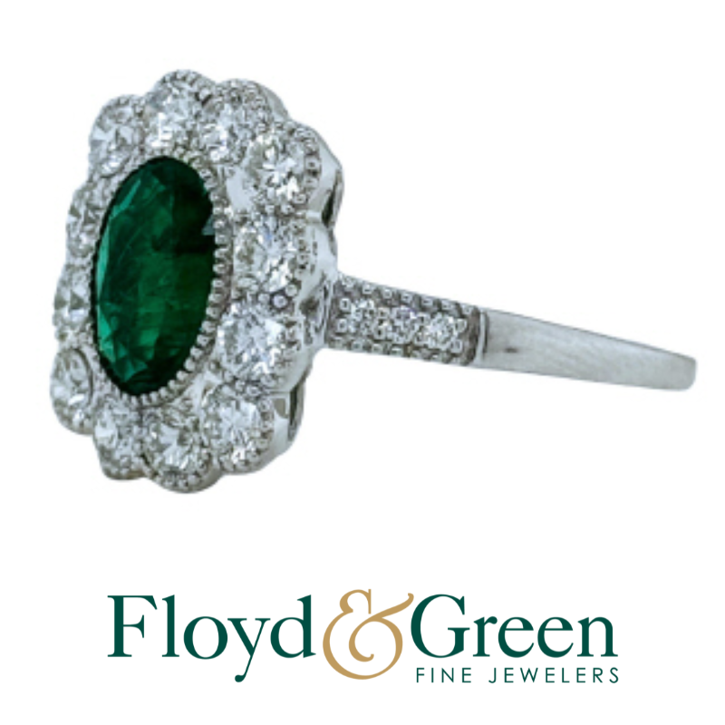 18Kt Oval Emerald and Diamond Halo Ring