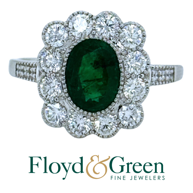 18Kt Oval Emerald and Diamond Halo Ring