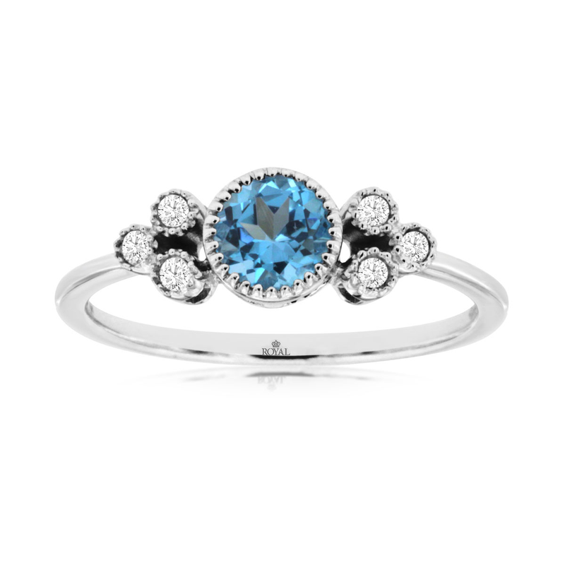 14KW 0.55ct blue topaz and 0.07ctw G-H/SI diamond ring size 7